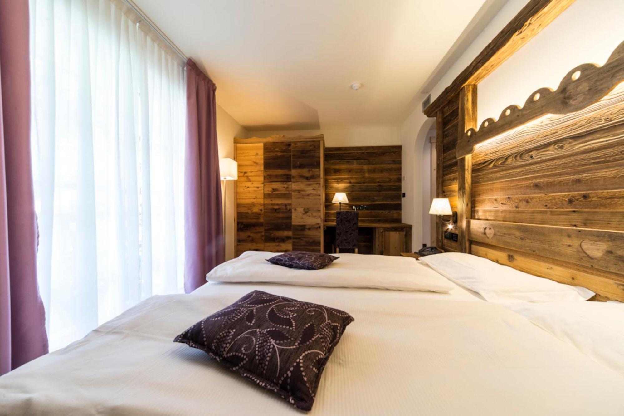 Alpholiday Dolomiti Wellness & Family Hotel Dimaro Szoba fotó