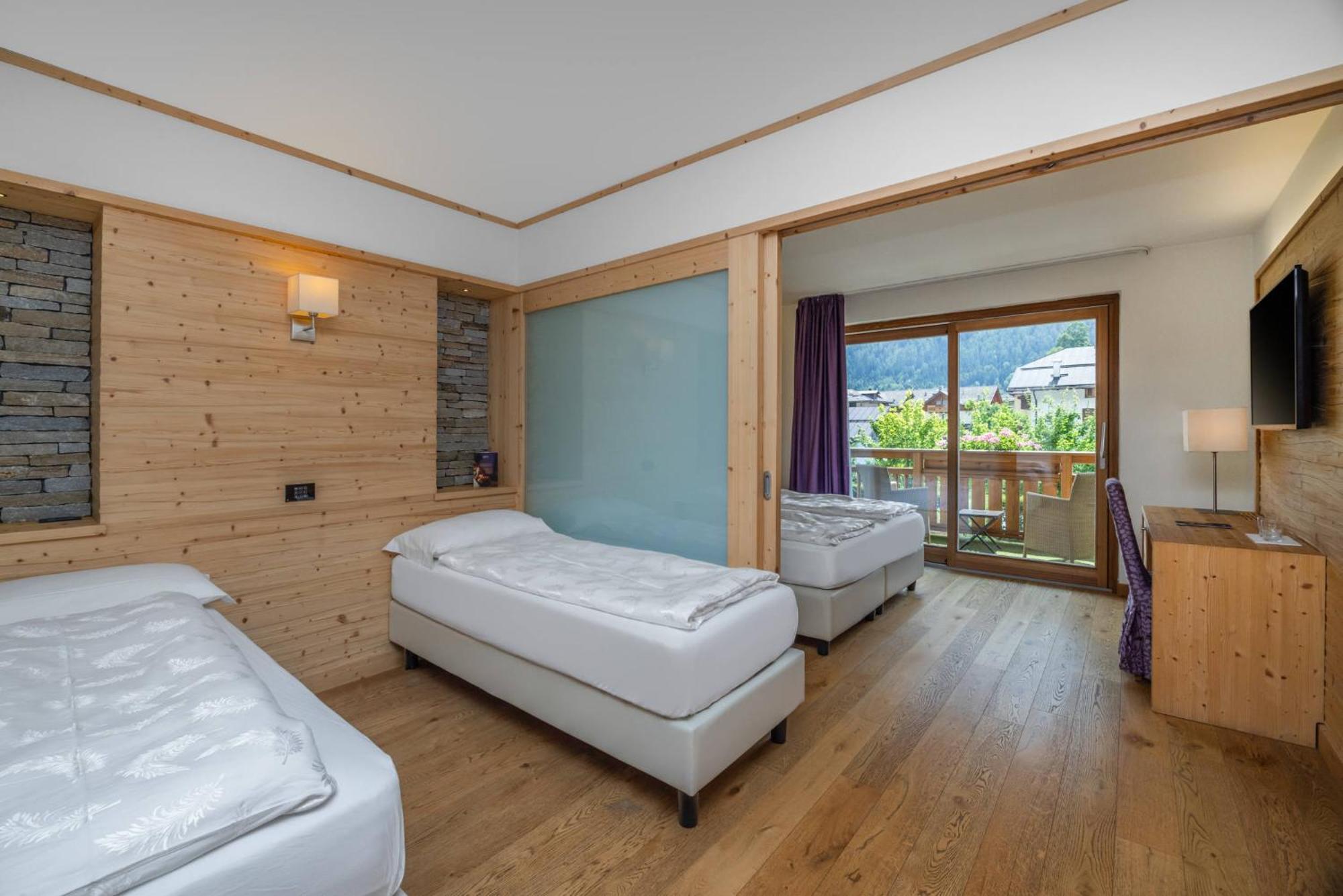 Alpholiday Dolomiti Wellness & Family Hotel Dimaro Szoba fotó